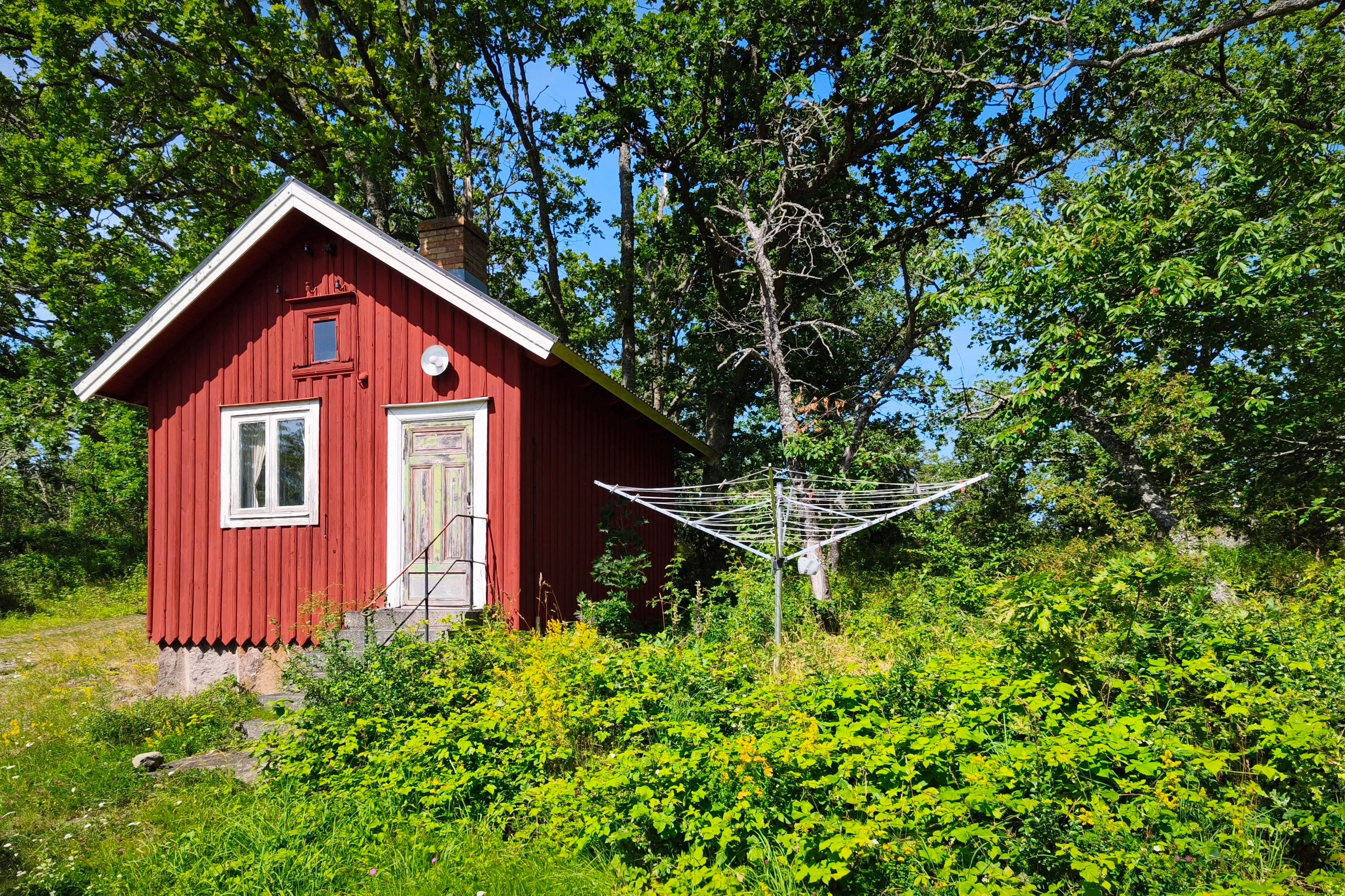 Doing laundry in an idyllic hut in Idö, Sweden.