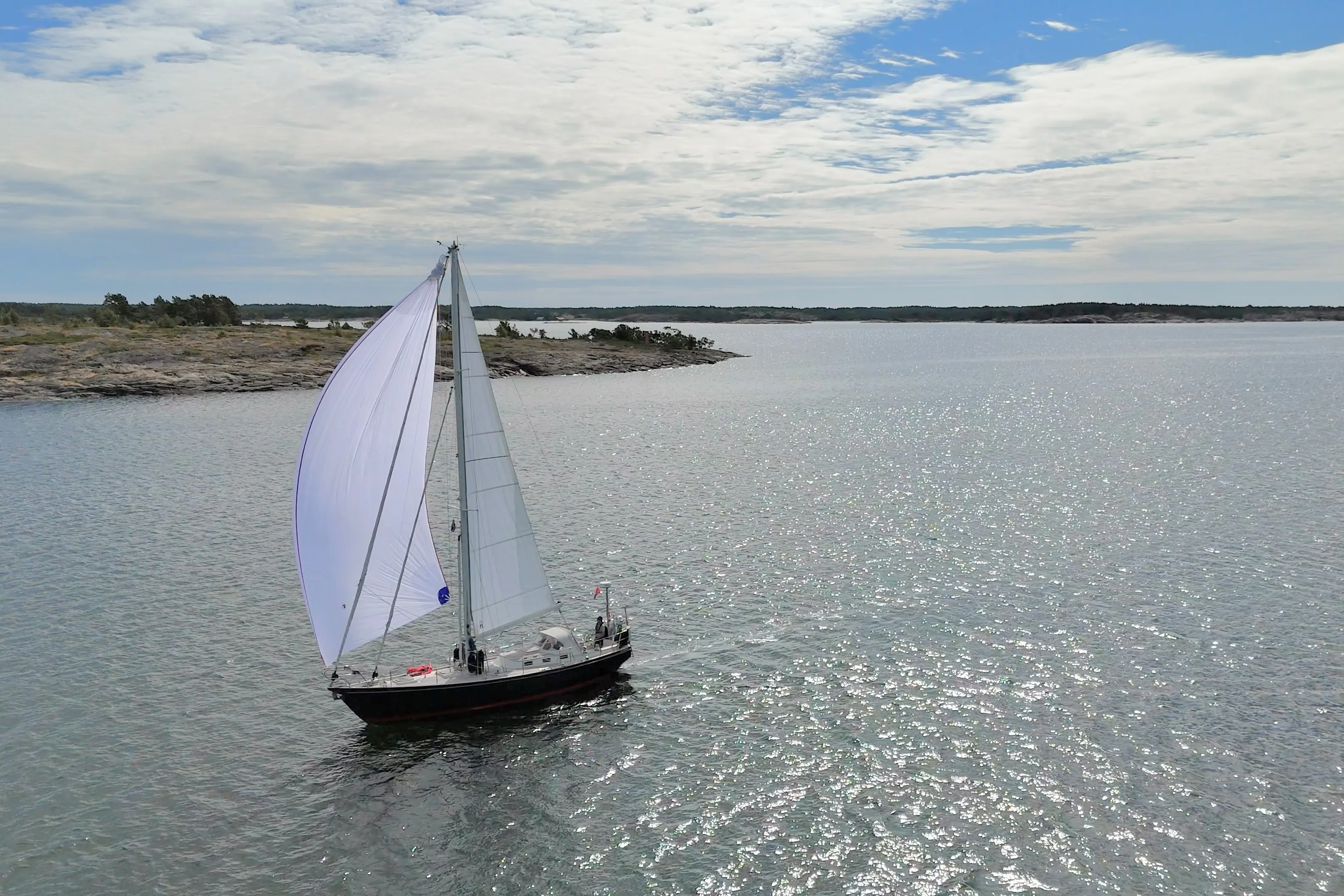 Coelacanth sails under gennaker in the skerries of the Åland islands.
