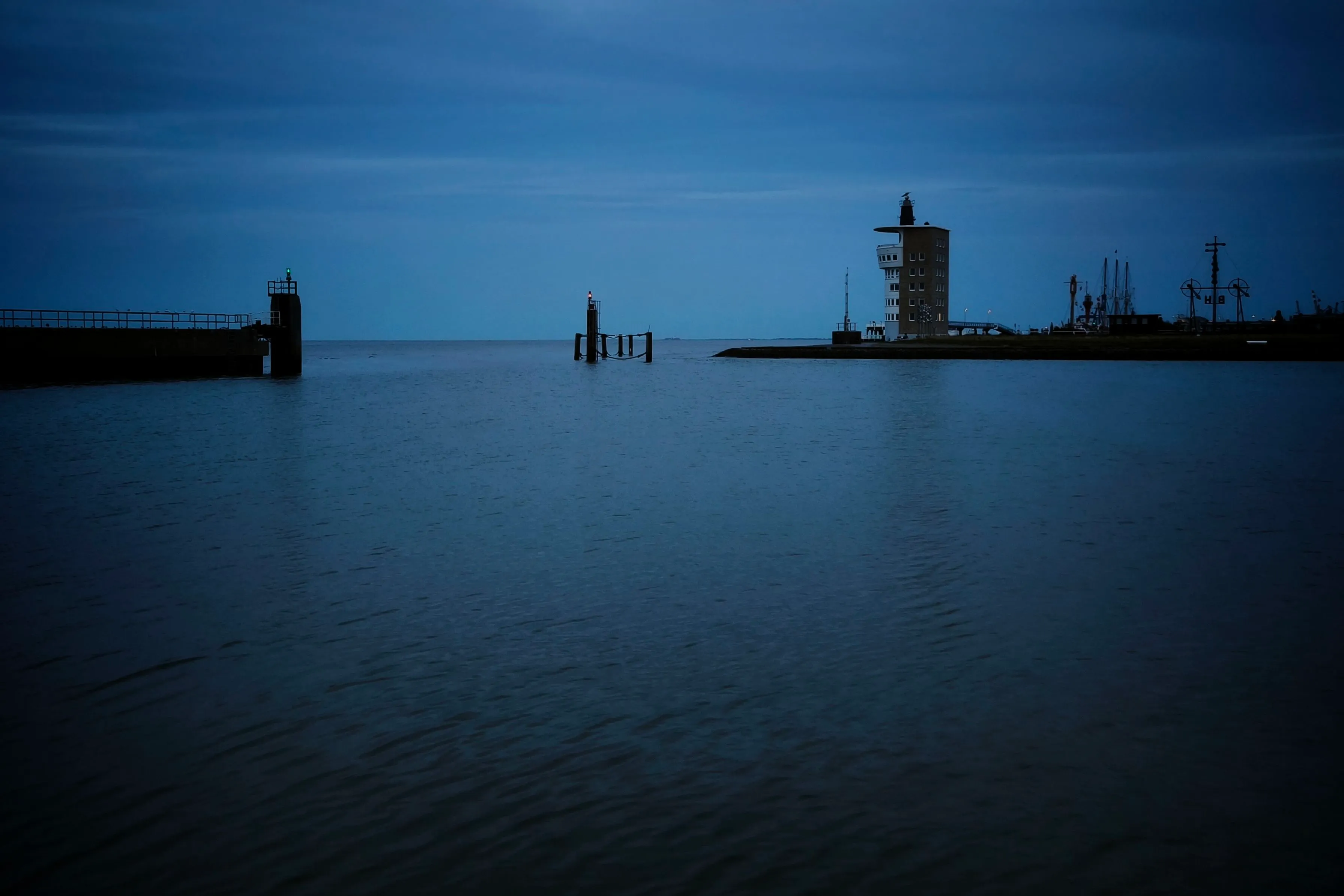 The entrance to the marina in Cuxhaven. On the right is the semaphore, the old way of publishing wind bulletins.