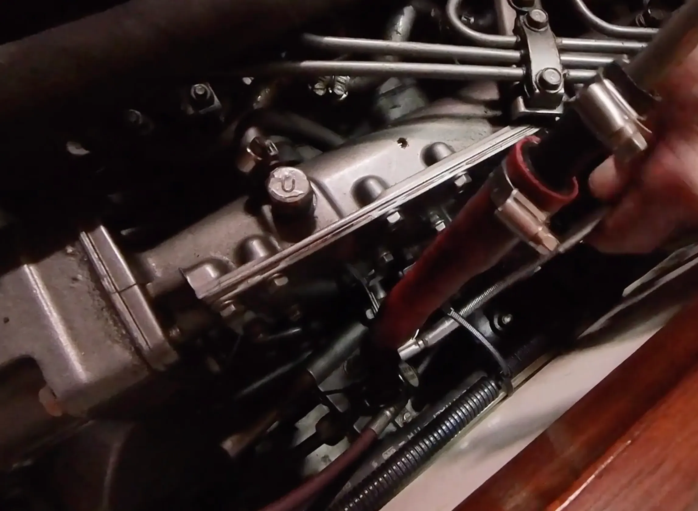 Extracting the old oil through the dipstick tube.